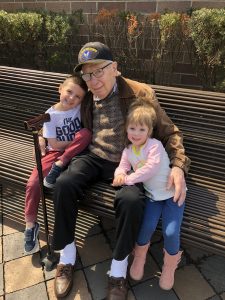 Photo By Katie Peck : Papa/Poppy Gordon with his granddaughter Katie Peck, her husband, J.D., and their children Slayton and Emmy outside Walker Bros Pancake House. March 2019.